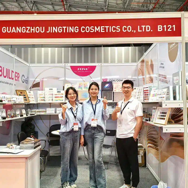 JTING staff at the Guangzhou Jingting Cosmetics Co., Ltd. trade show booth in Vietnam, highlighting the brand's global OEM/ODM service capabilities.
