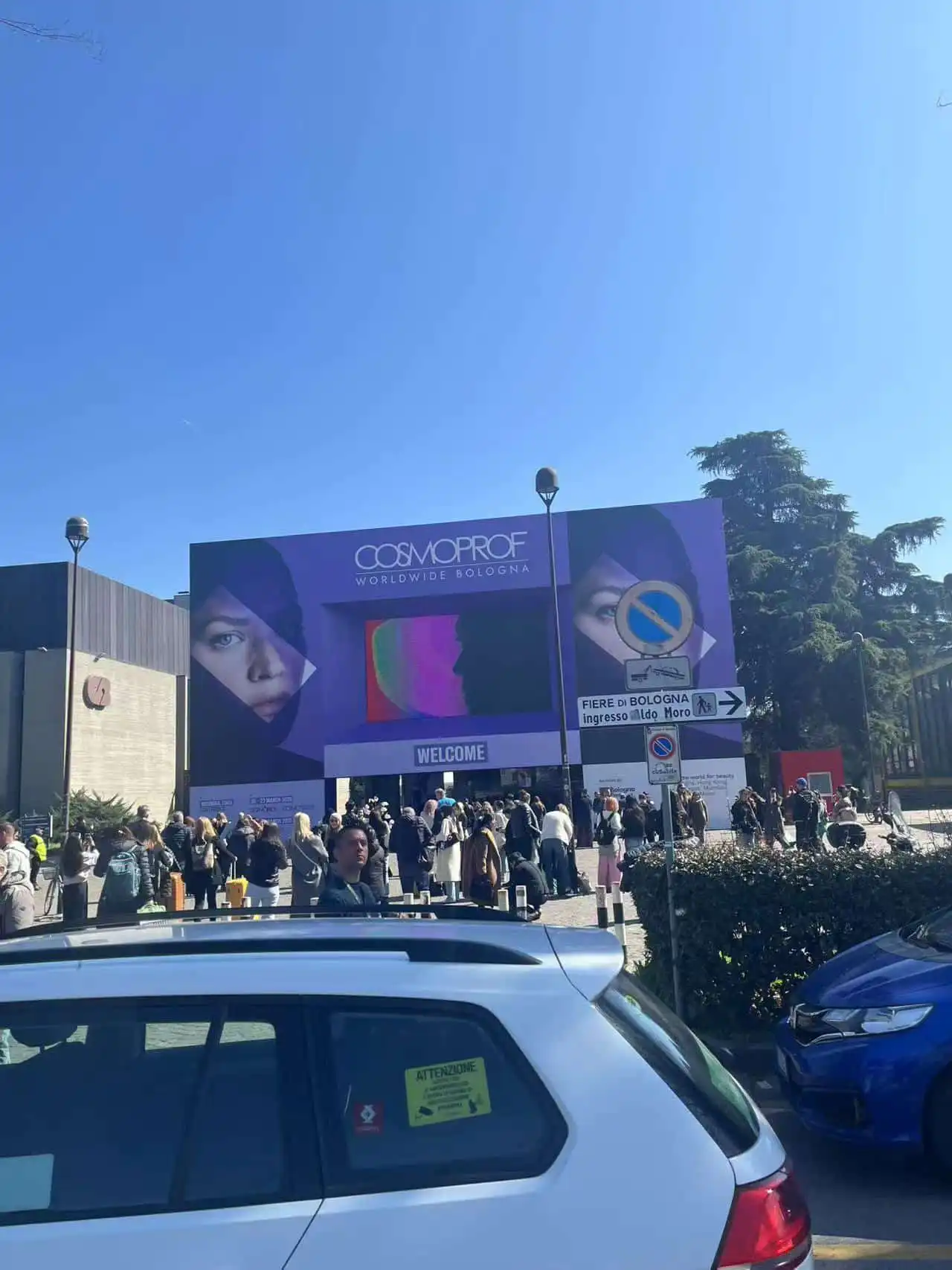 Guangzhou Jingting Cosmetics Co., Ltd. trade show booth at a professional beauty exhibition in Italy, demonstrating JTING's global presence and extensive range of OEM/ODM nail gel products.