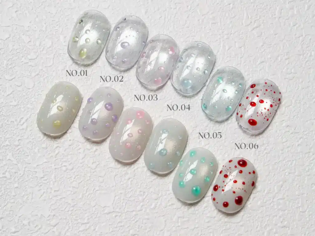 Translucent tint water drop nail art swatches showing 3D round domes and wet glass dimension