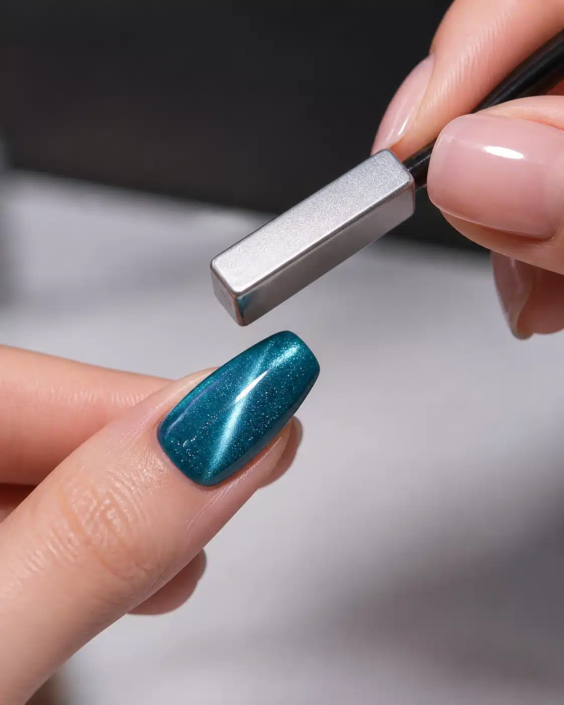 Cat eye gel polish magnet application and light pattern demonstration