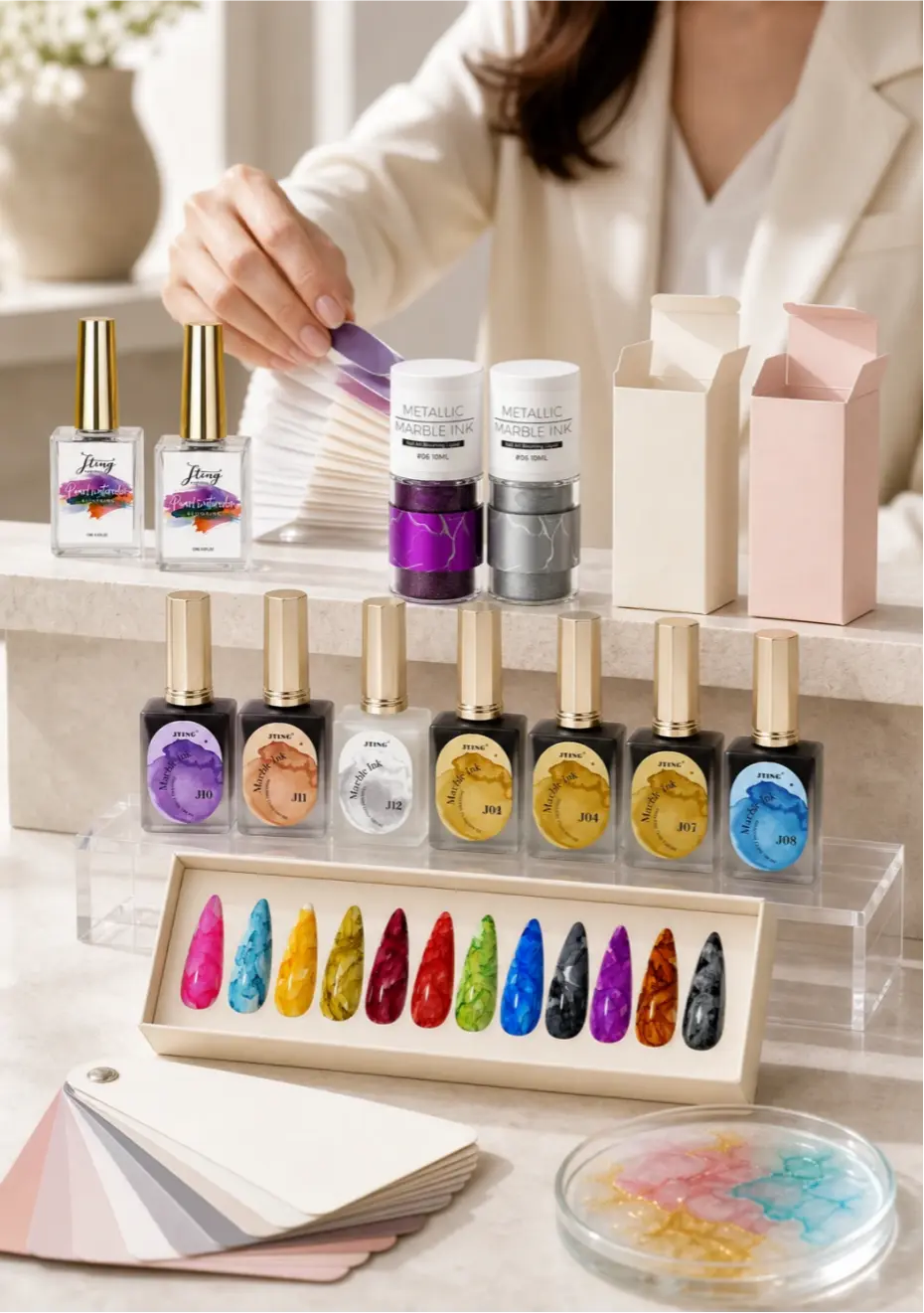 JTING private label Marble Ink collection with custom bottles, packaging boxes, color chips and nail swatches