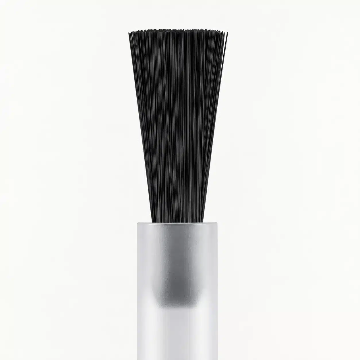 Black bottle brush with a straight bristle edge and translucent plastic stem.