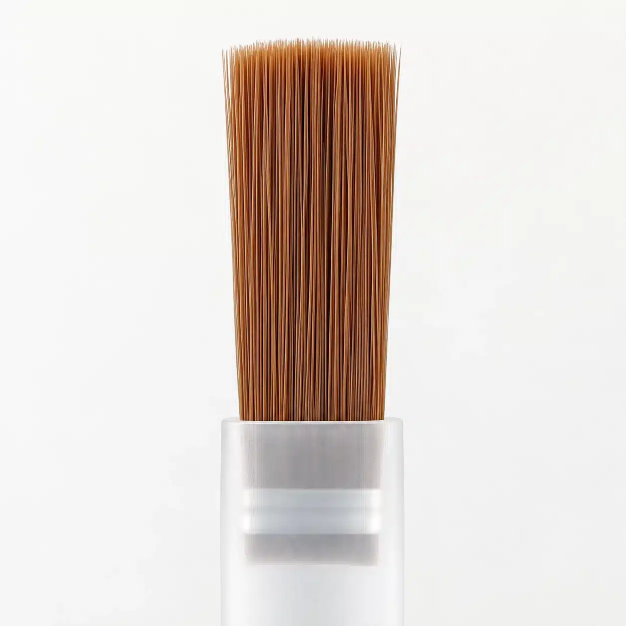 Brown bottle brush with a straight bristle edge and translucent plastic stem.