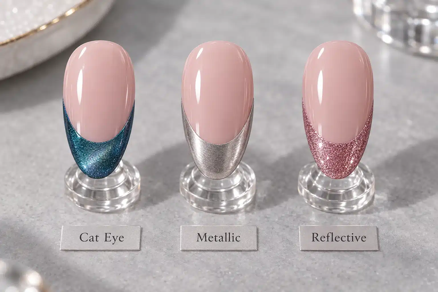 Blue cat eye, silver metallic and pink reflective French tips on nude pink nail samples
