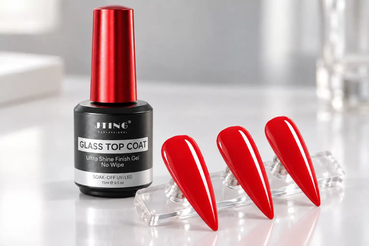 JTING Glass Top Coat beside glossy red tapered nail samples