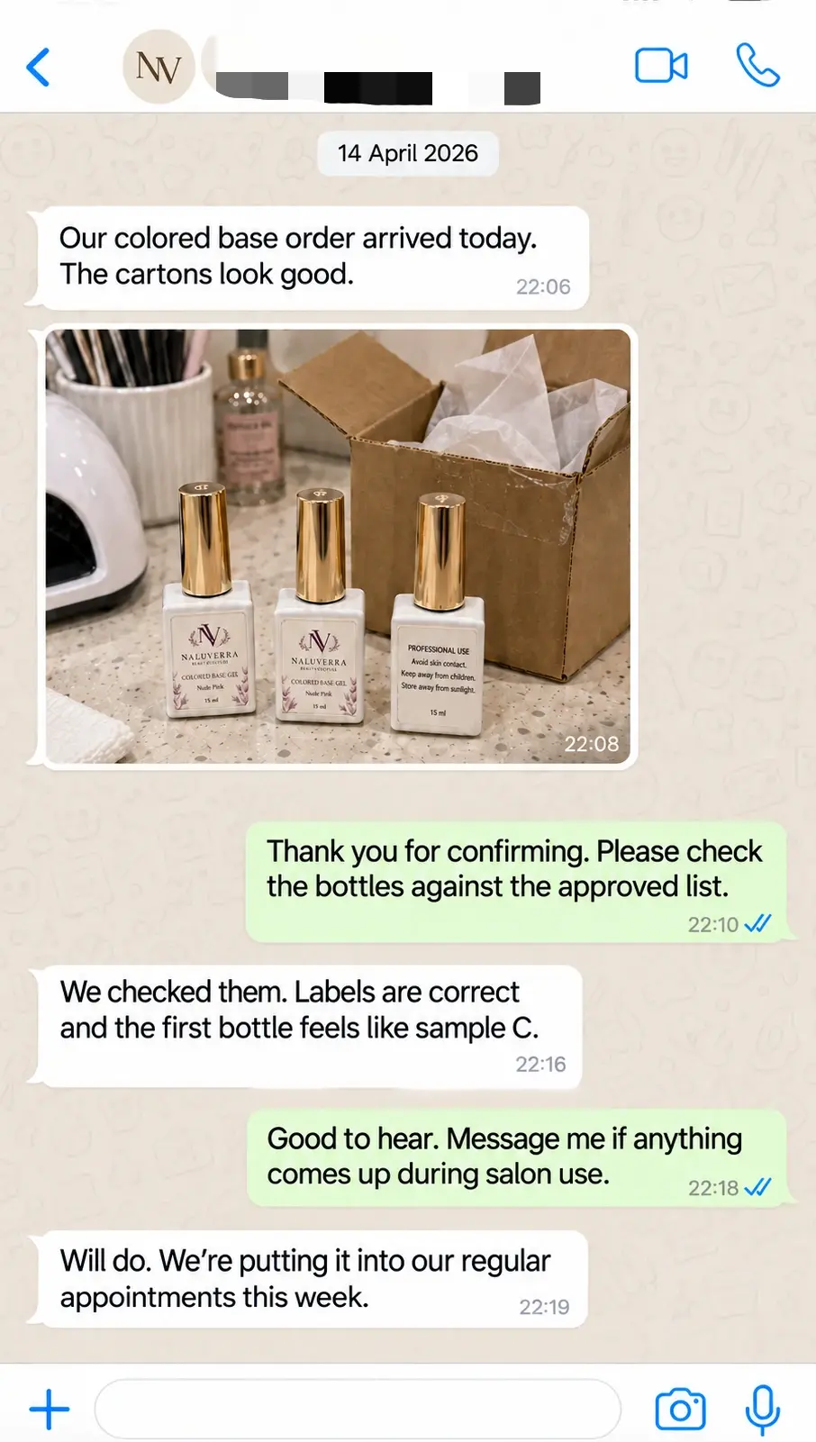 WhatsApp confirmation that the colored base gel order arrived and matched the approved sample