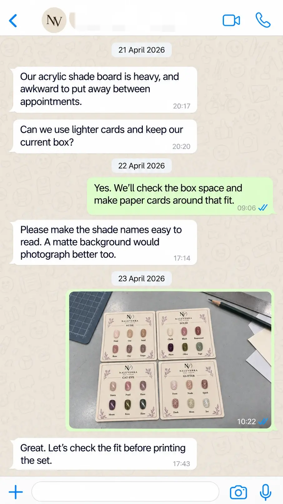WhatsApp discussion replacing a heavy acrylic display with matte paper shade cards that fit the existing box