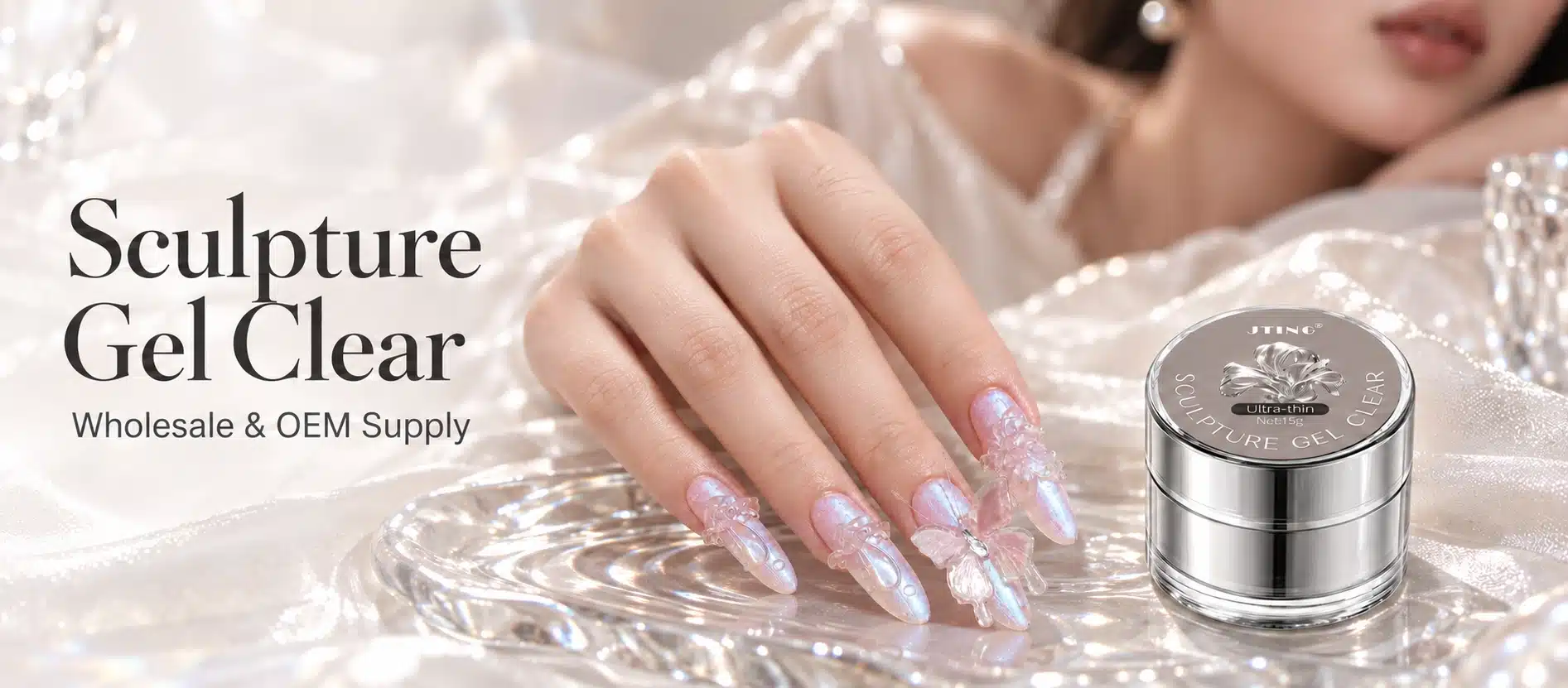 Silver Sculpture Gel Clear 15 g jar beside a model's iridescent manicure with transparent butterfly and floral nail art