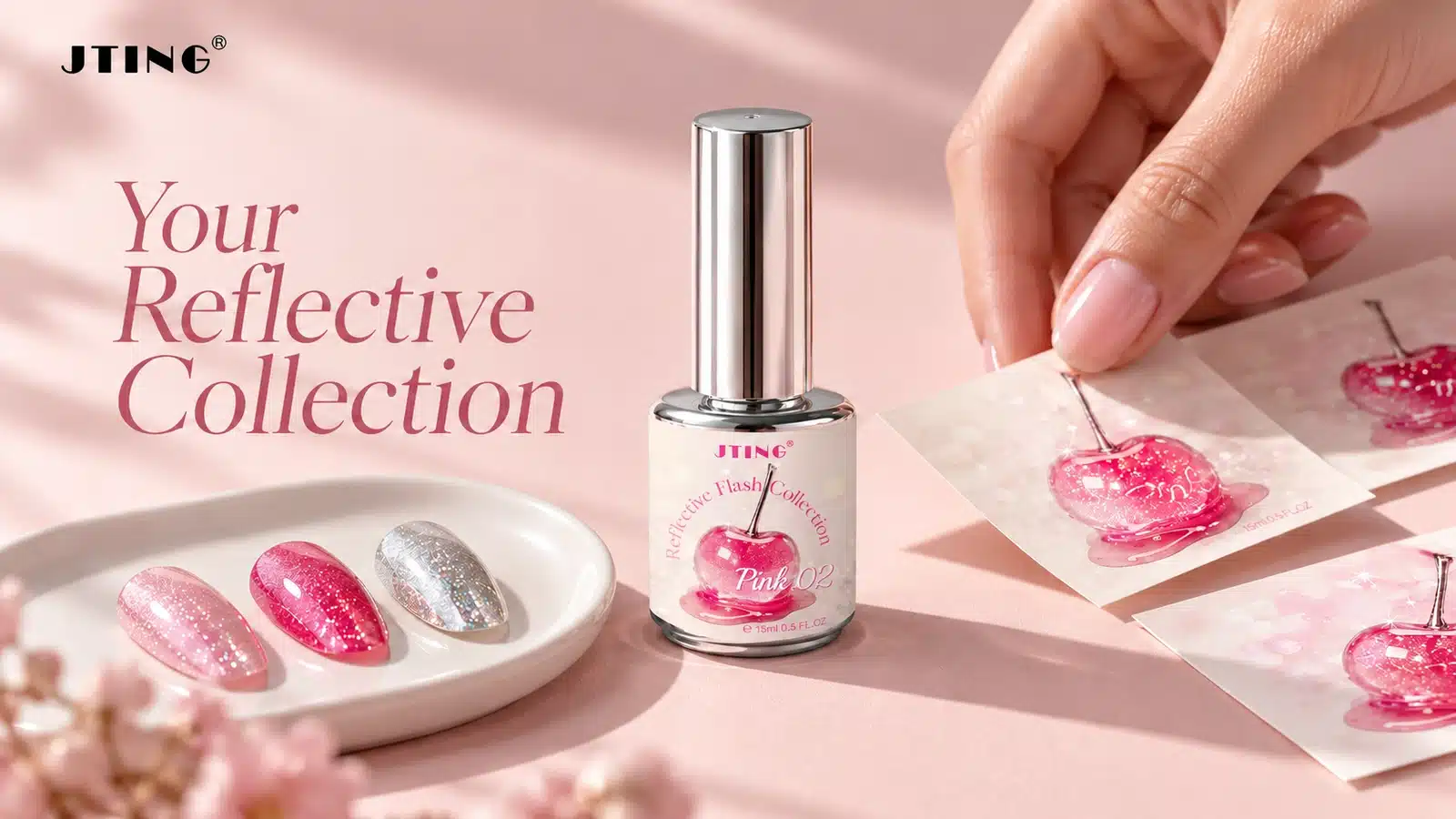 Silver-capped reflective gel bottle beside pink label proofs and glitter nail samples